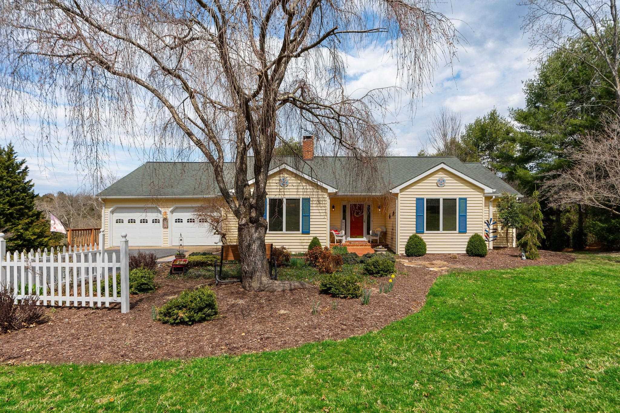 53 Fort River Road Verona, VA 24482 - Photo 1 of 75 a front view of a house with garden