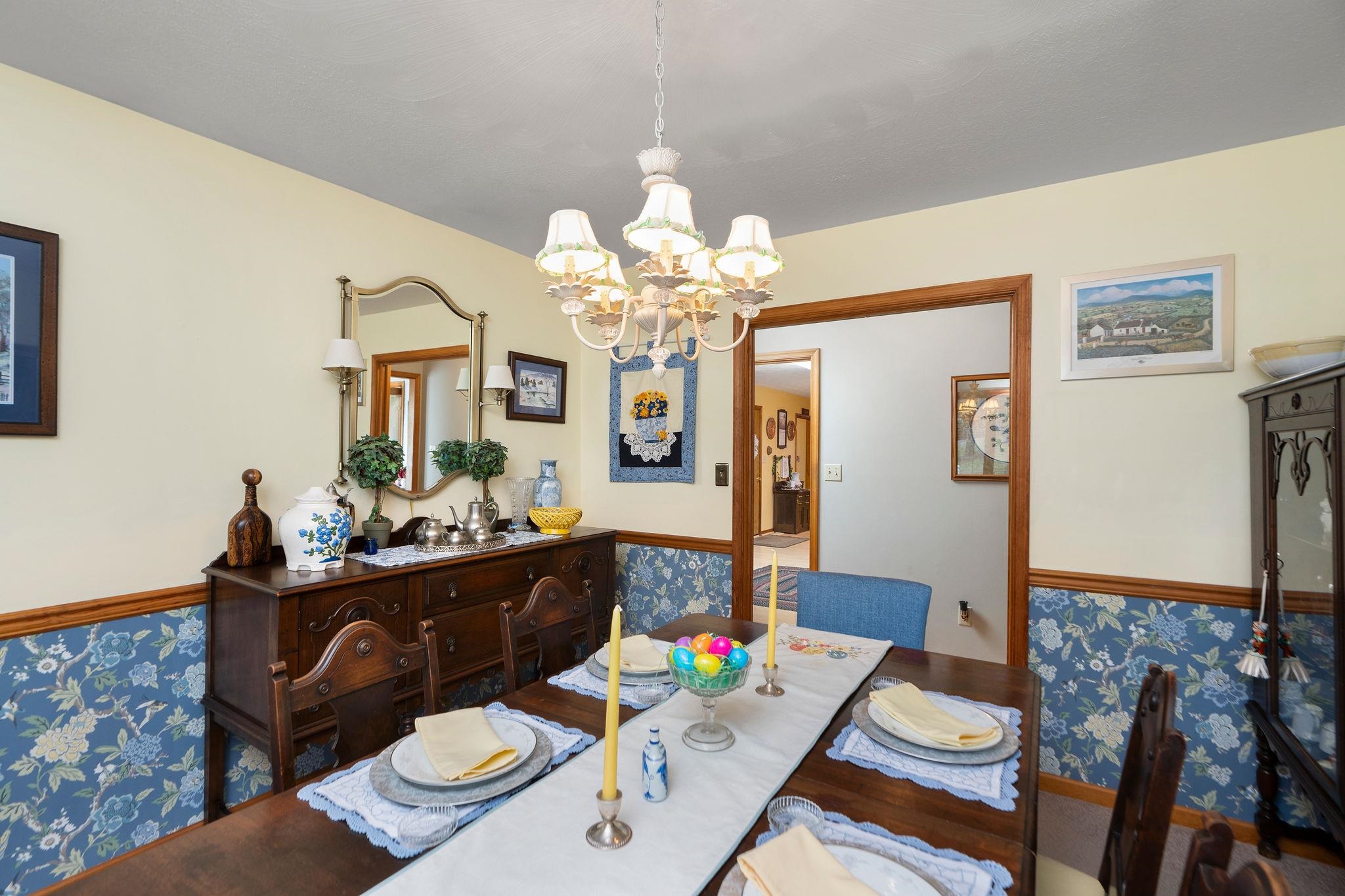 53 Fort River Road Verona, VA 24482 - Photo 14 of 75 a view of a dining room with furniture and wooden floor