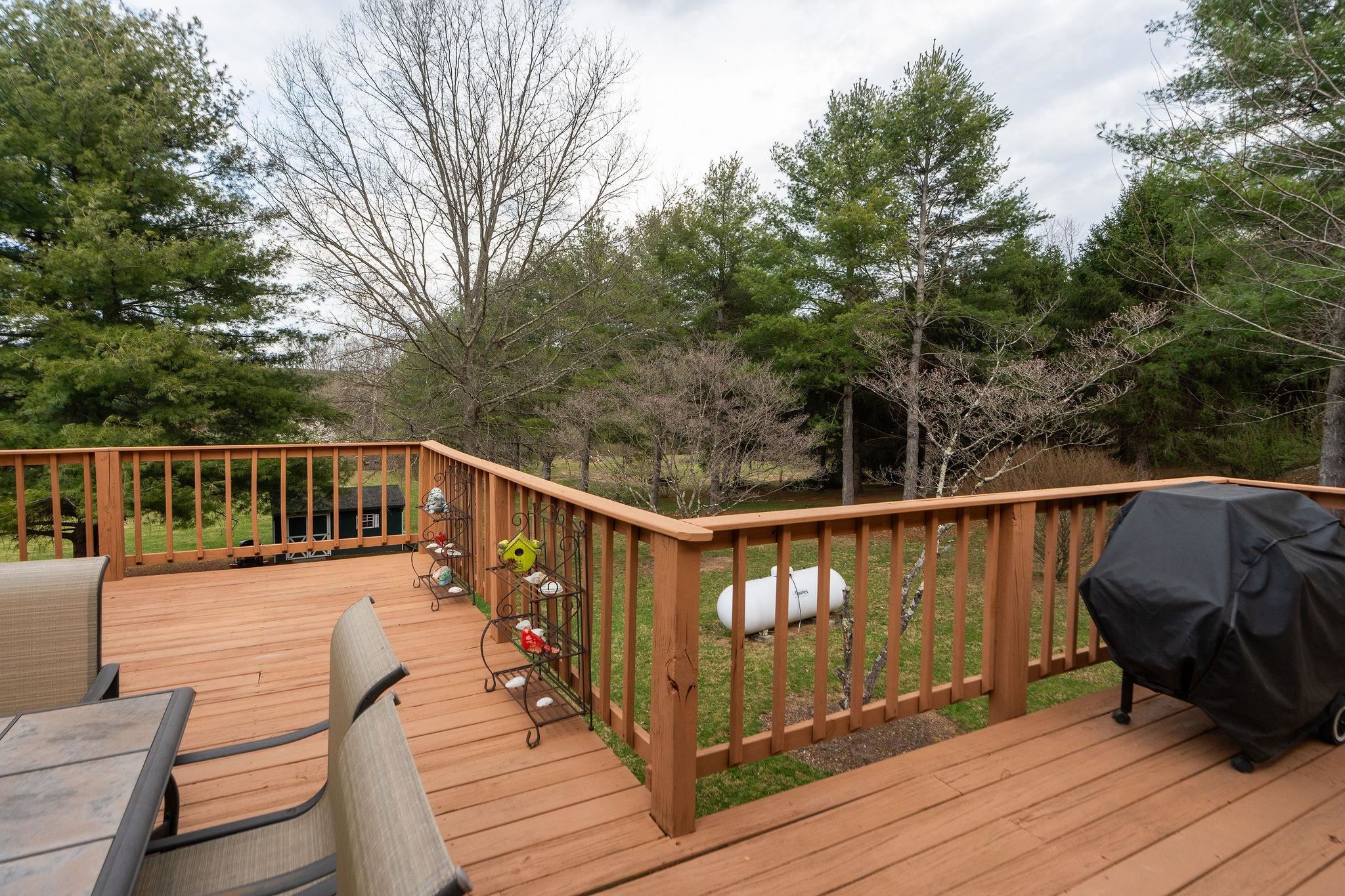 53 Fort River Road Verona, VA 24482 - Photo 42 of 75 a view of balcony with wooden floor and outdoor seating