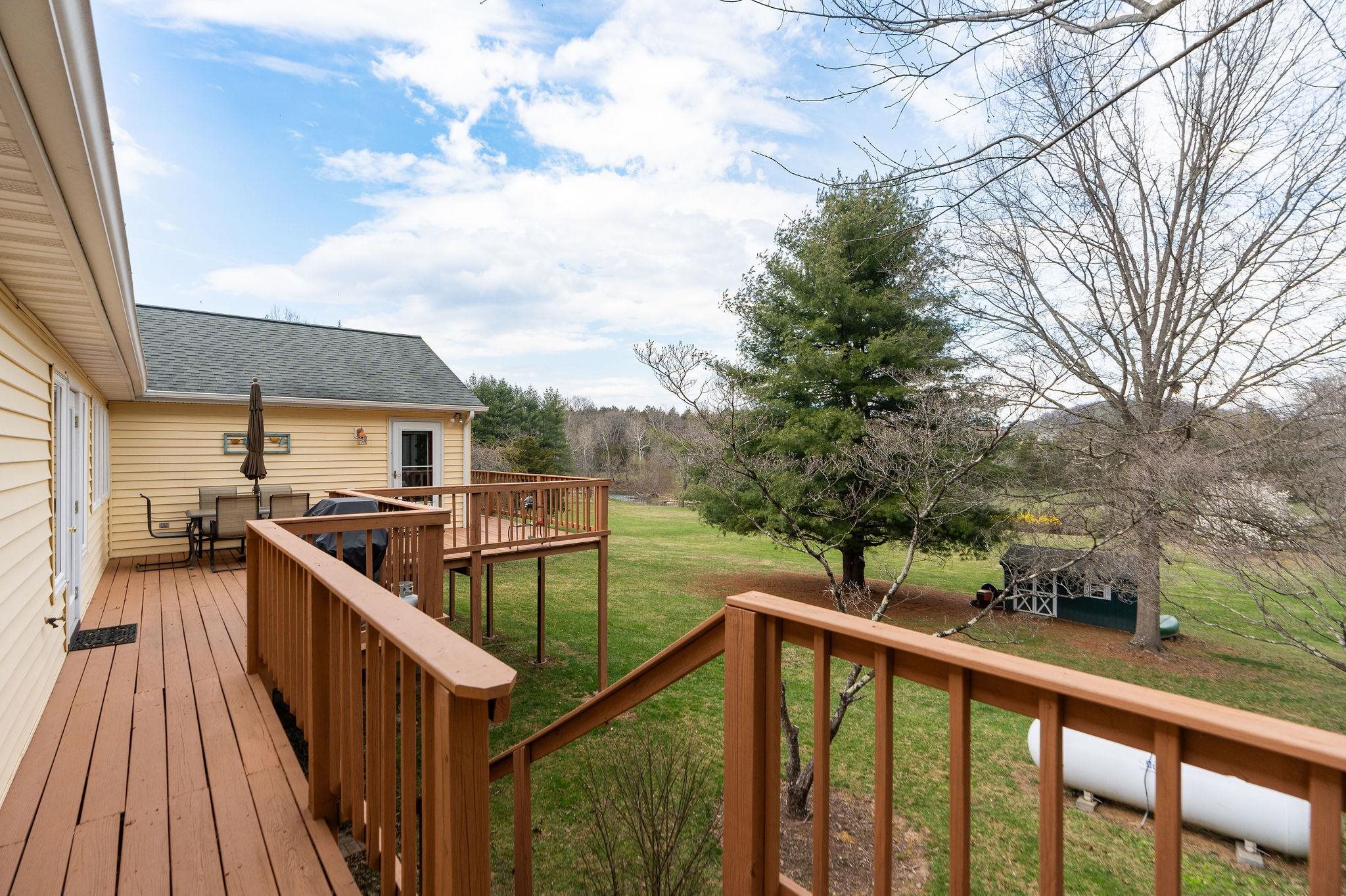 53 Fort River Road Verona, VA 24482 - Photo 43 of 75 a view of a balcony with wooden floor and fence
