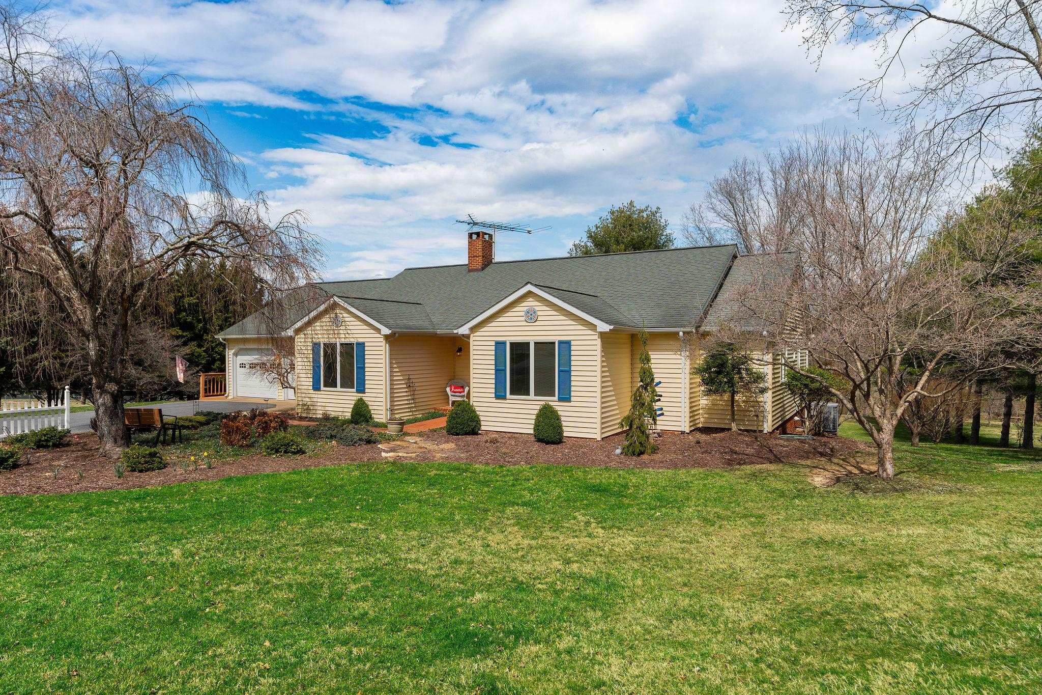 53 Fort River Road Verona, VA 24482 - Photo 59 of 75 a front view of a house with a yard and sitting area