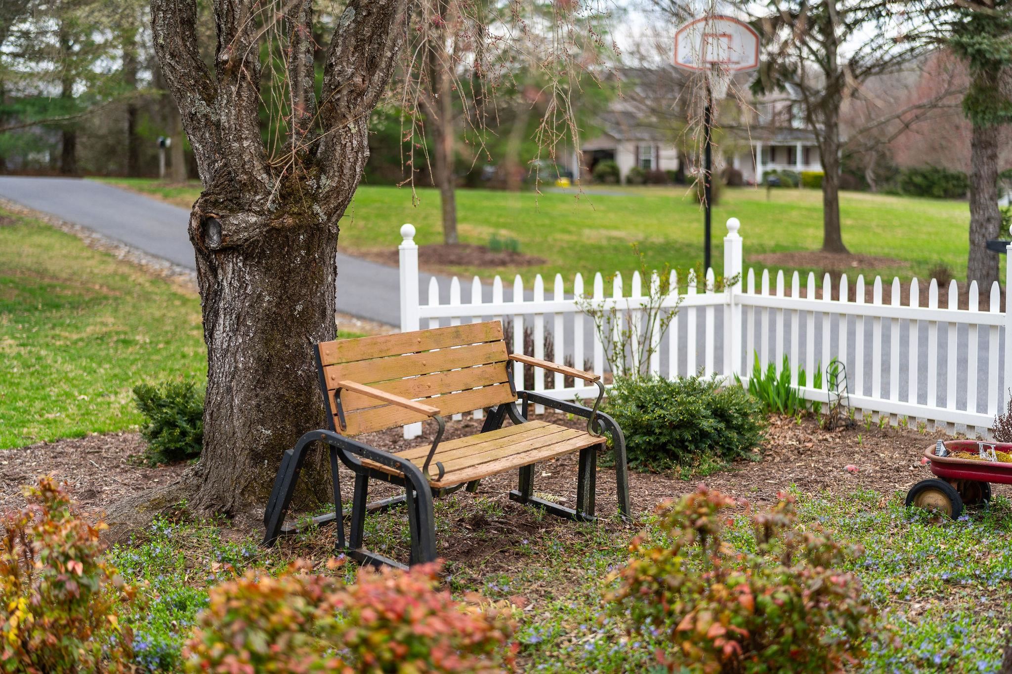53 Fort River Road Verona, VA 24482 - Photo 63 of 75 a wooden bench sitting in the middle of a yard