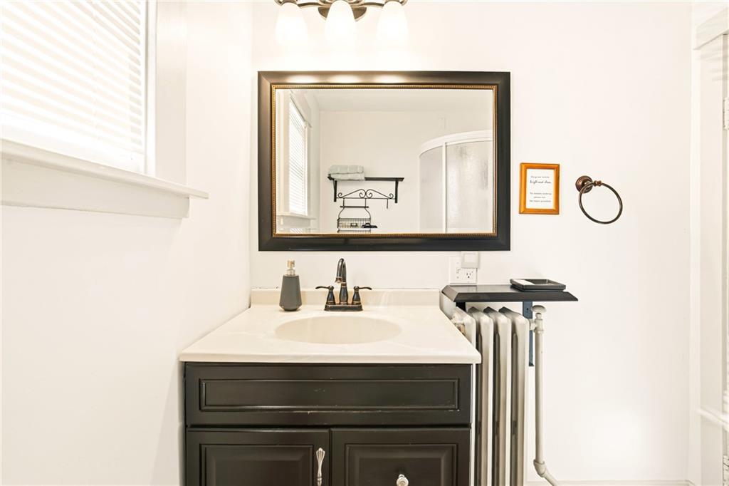 2237 Ridgeview Road Mount Pleasant, PA 15666 - Photo 22 of 39 a bathroom with a sink and a mirror