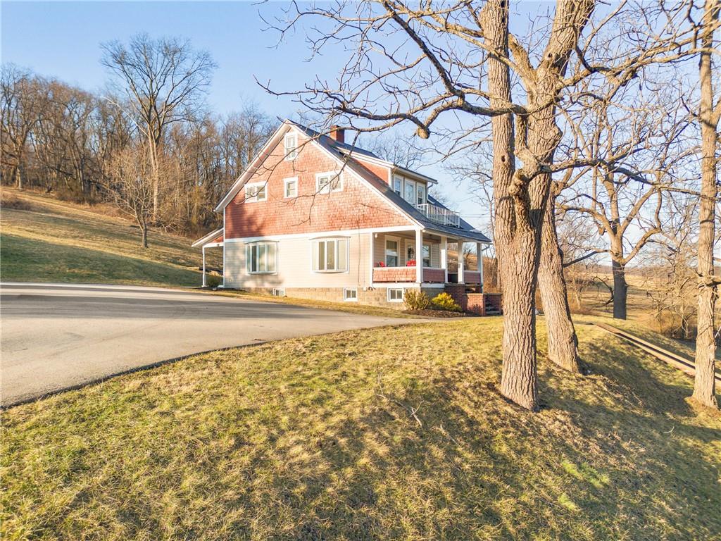 2237 Ridgeview Road Mount Pleasant, PA 15666 - Photo 35 of 39 a house with trees in front of it