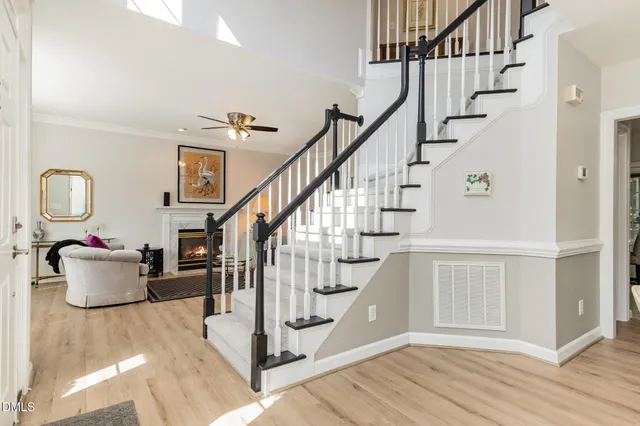 a living room with furniture or couch and a fireplace