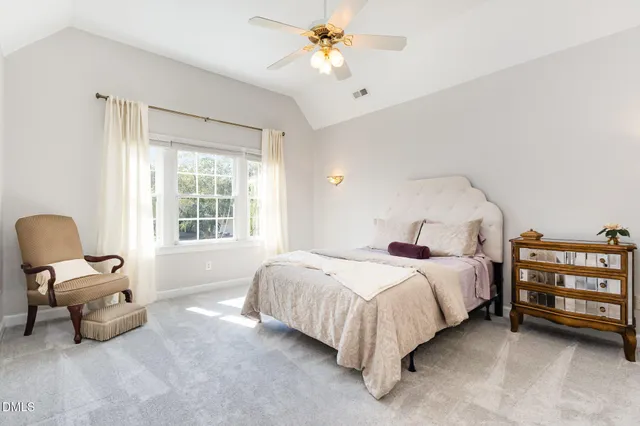 a bathroom with a double vanity sink mirror and shower