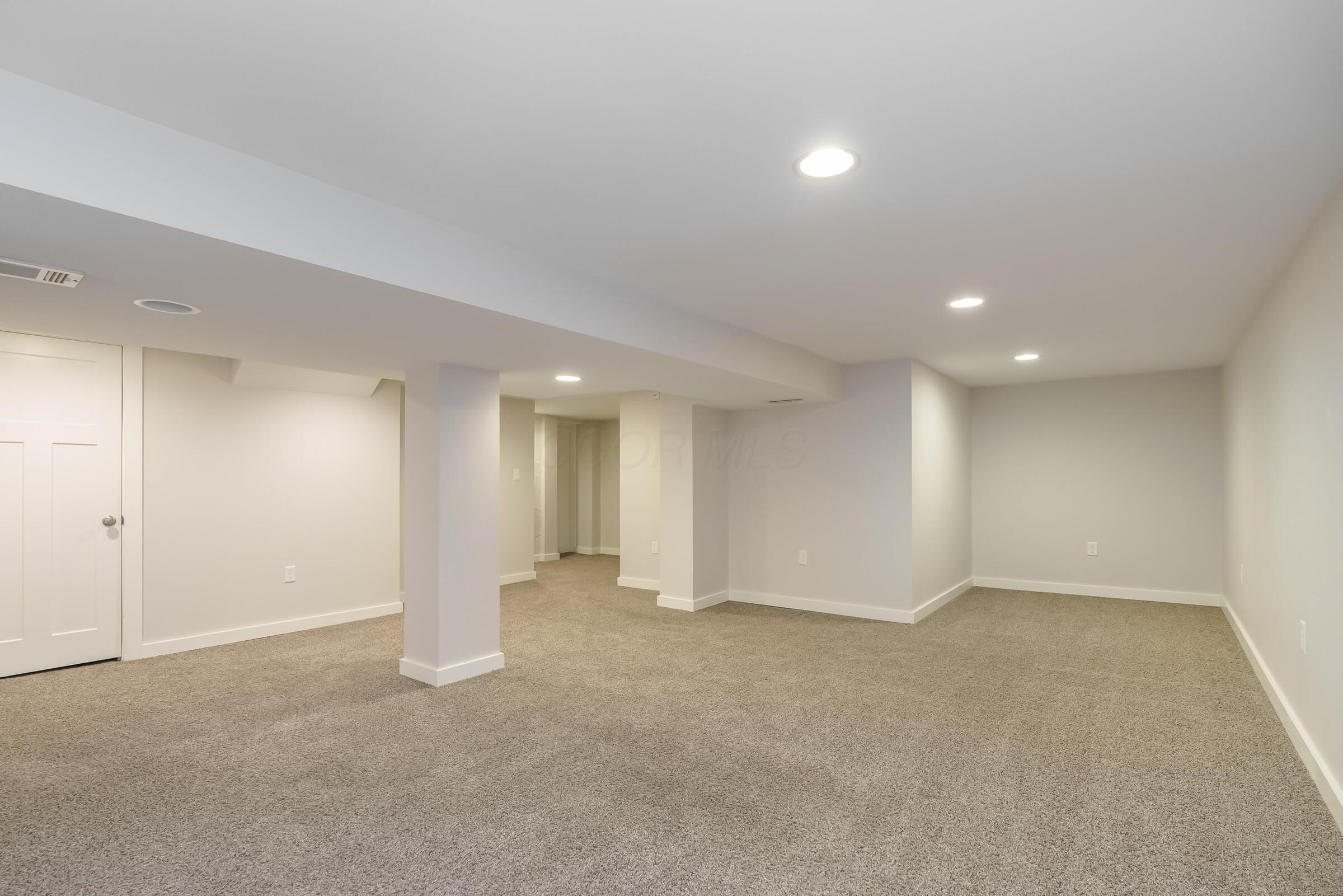 163 Garden Road Columbus, OH 43214 - Photo 22 of 46 Incredible flexible living space in this deluxe finished lower level with a half bathroom.