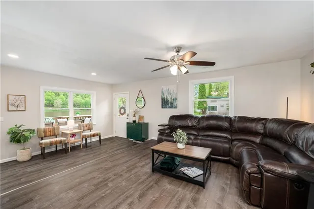 a living room with furniture and a window
