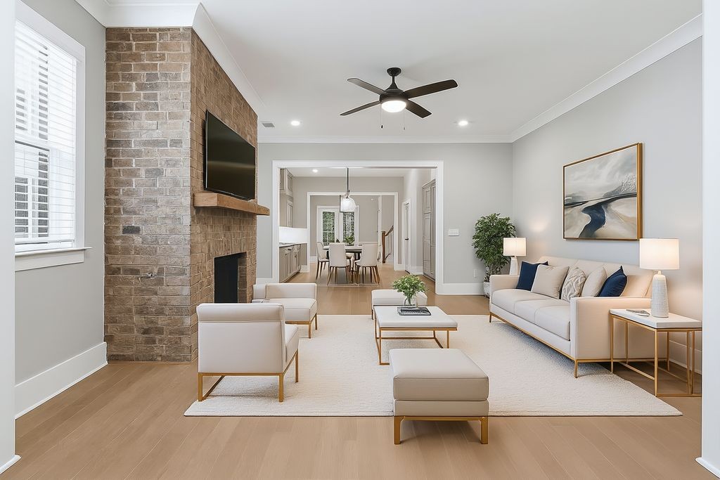 207 Fairground Street, Unit 102 Franklin, TN 37064 - Photo 35 of 70 a living room with furniture and a fireplace