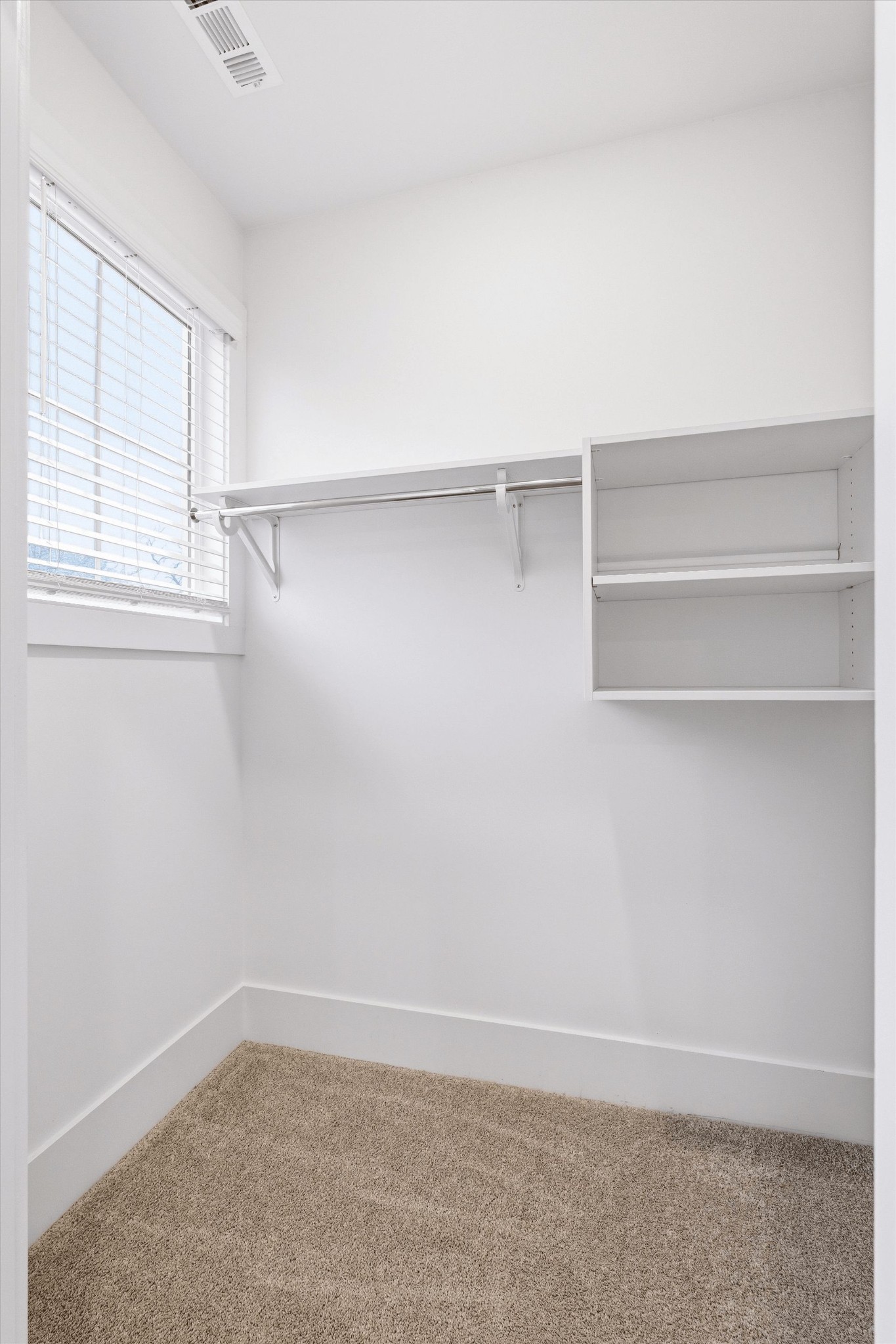 207 Fairground Street, Unit 102 Franklin, TN 37064 - Photo 57 of 70 a view of an empty room with a window