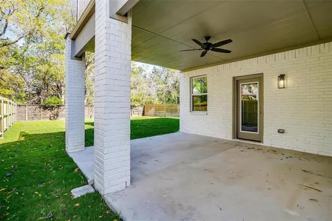 a view of a porch in front of a house