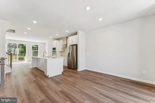 a view of kitchen with wooden floor