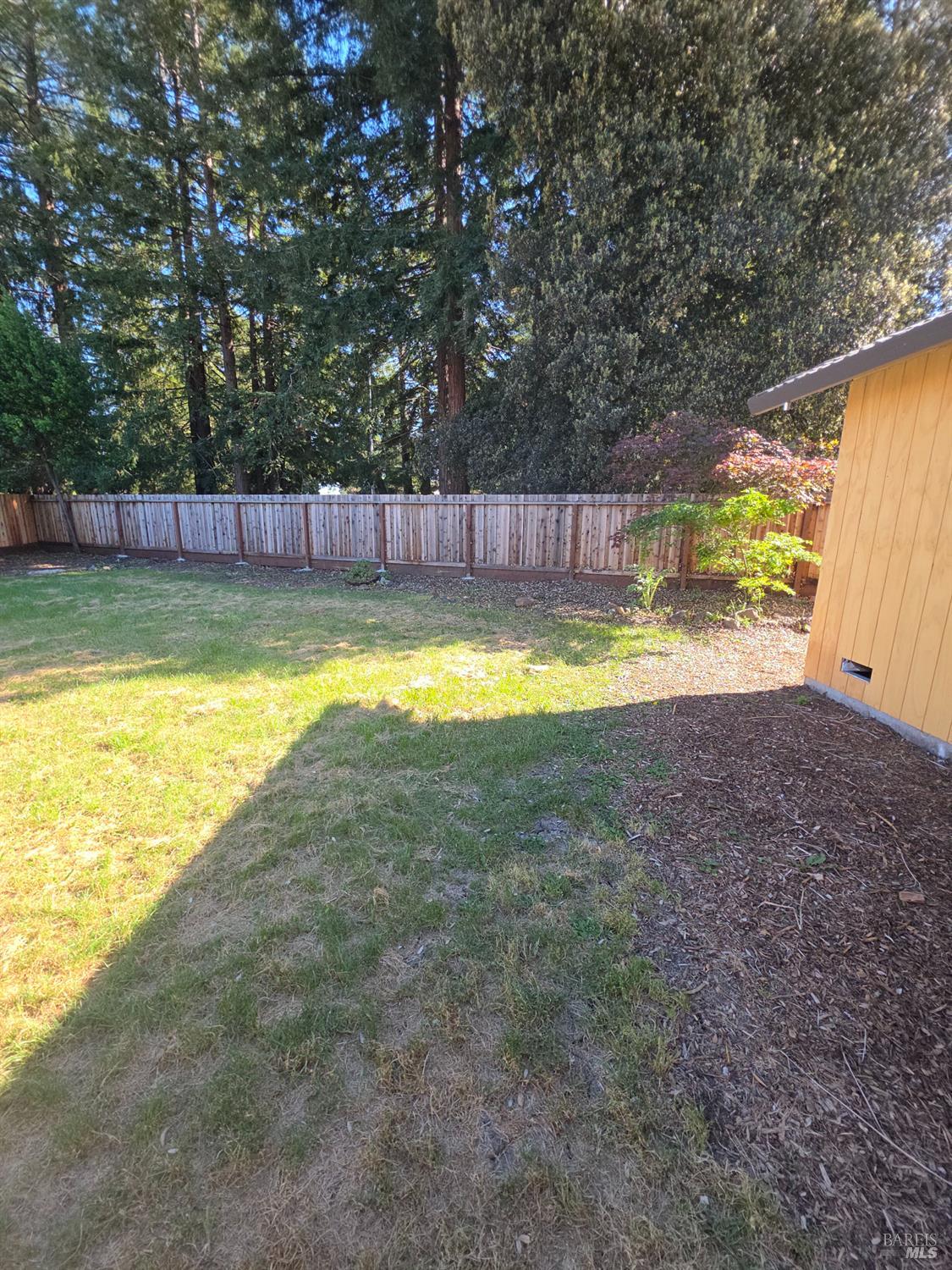 6375 San Benito Way Rohnert Park, CA 94928 - Photo 2 of 24 a view of a swimming pool with an outdoor seating and a yard