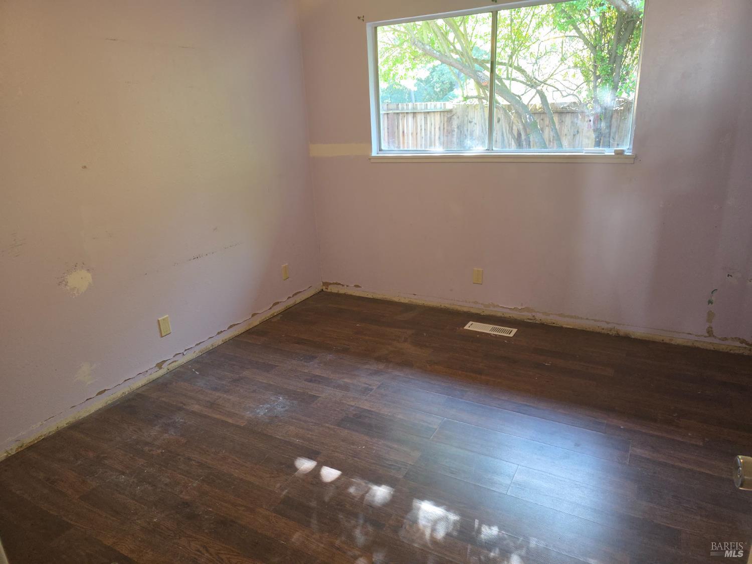 6375 San Benito Way Rohnert Park, CA 94928 - Photo 8 of 24 an empty room with wooden floor and windows