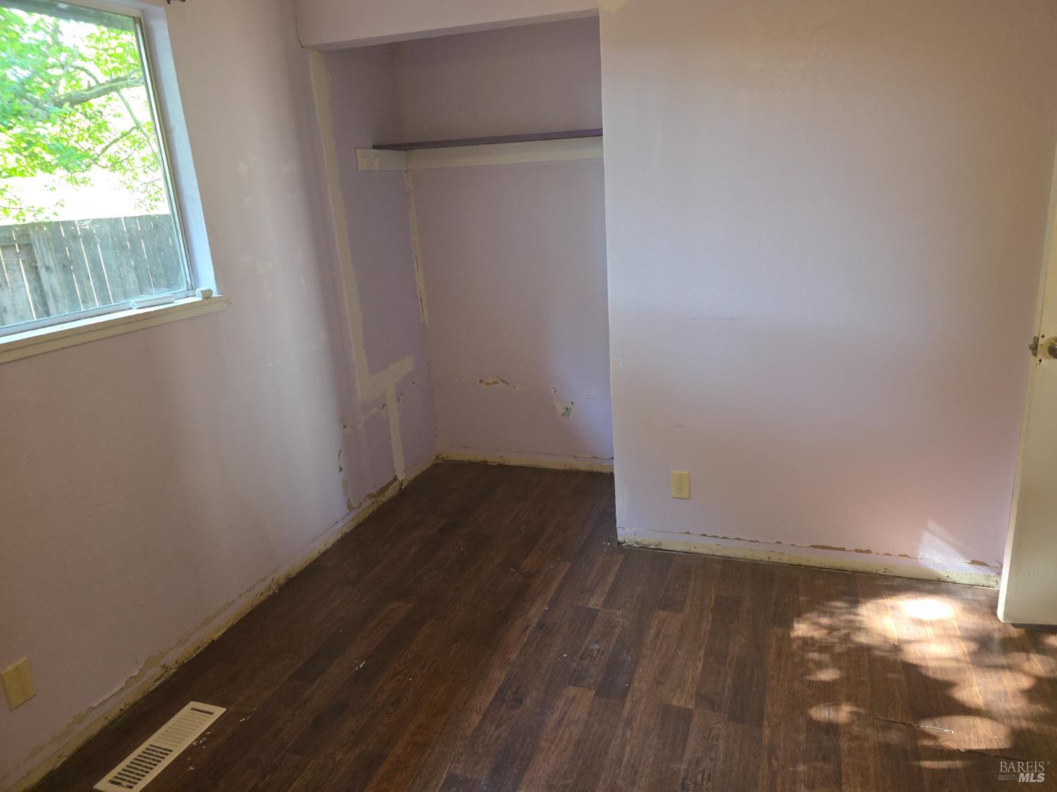 6375 San Benito Way Rohnert Park, CA 94928 - Photo 9 of 24 an empty room with wooden floor and windows