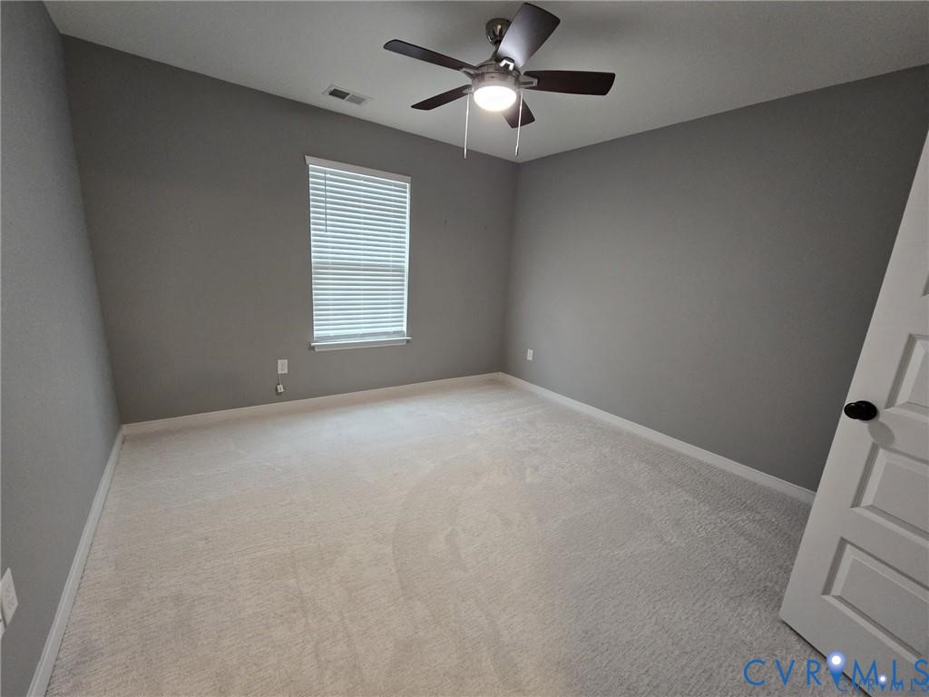 7825 Old Guild Road Richmond, VA 23237 - Photo 25 of 27 Carpeted room featuring a ceiling fan with integra