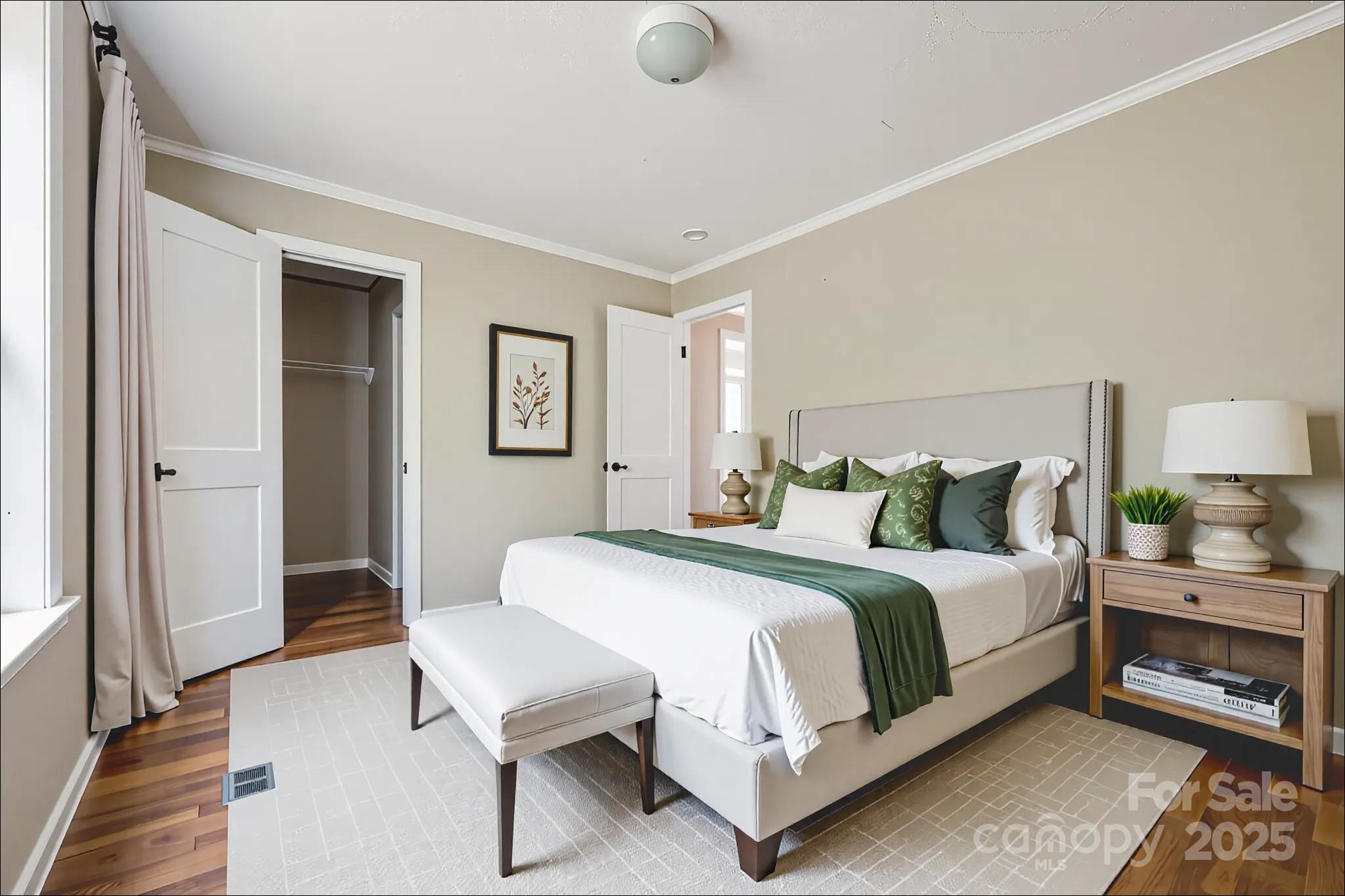 4066 General Howe Road Riegelwood, NC 28456 - Photo 13 of 27 a bedroom with a bed and a table