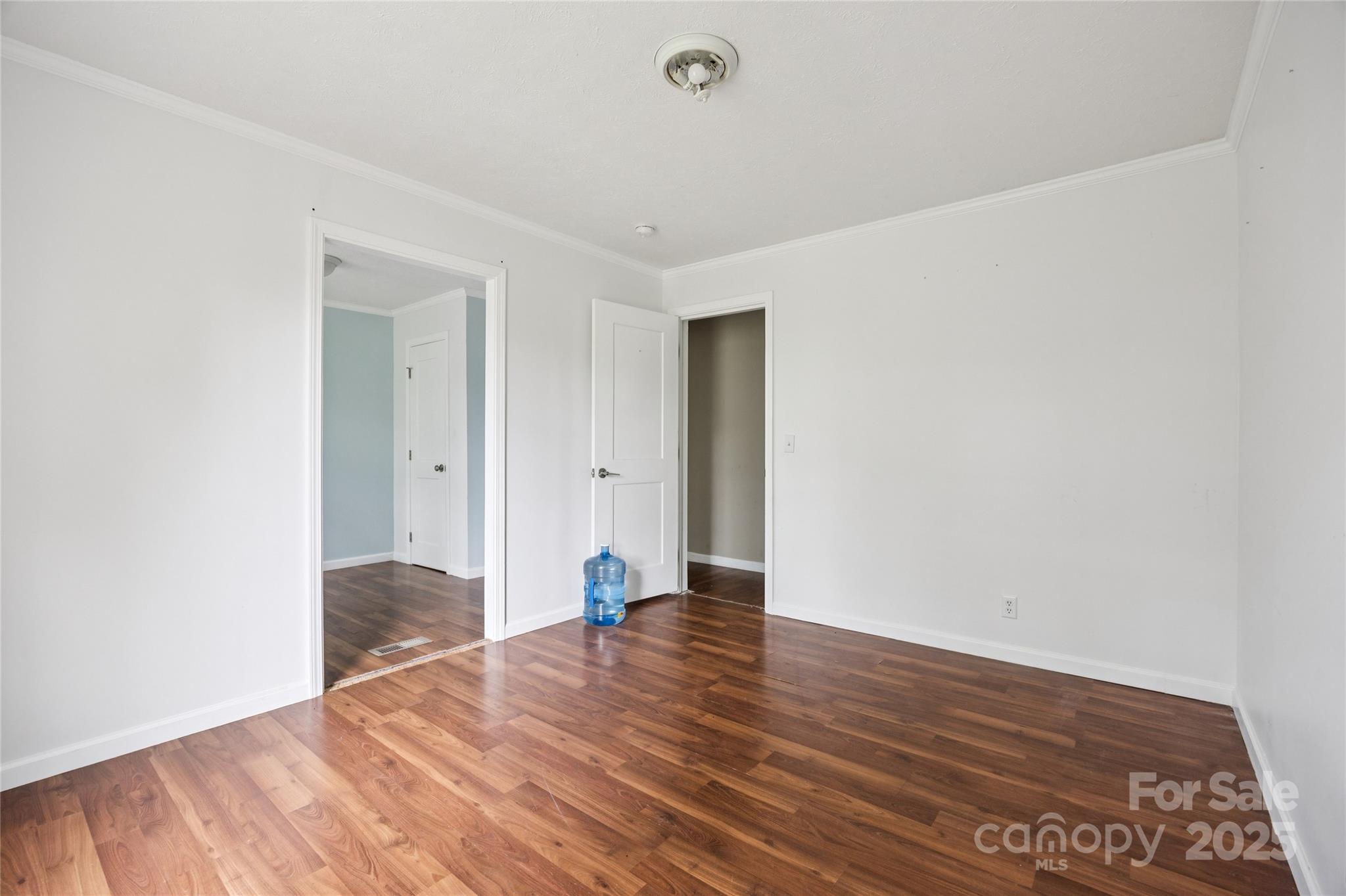 4066 General Howe Road Riegelwood, NC 28456 - Photo 14 of 27 a view of an empty room with wooden floor and a window
