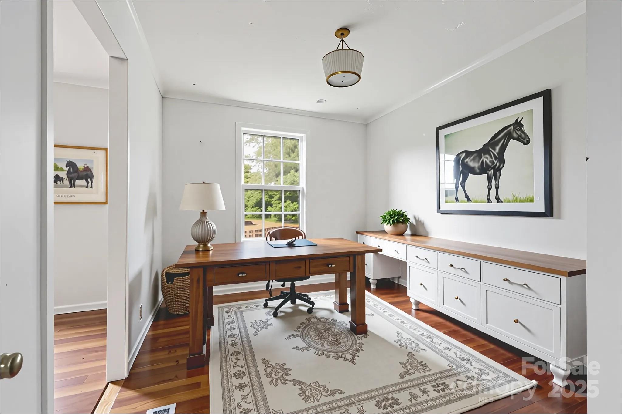 4066 General Howe Road Riegelwood, NC 28456 - Photo 19 of 27 a view of a workspace and wooden floor