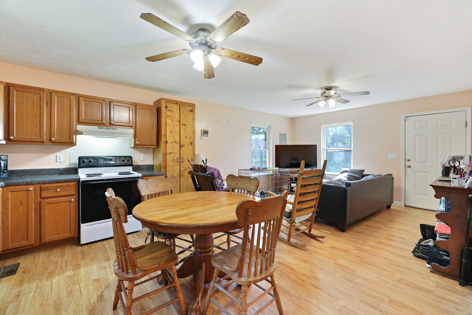 634 Bennett Hill Road Red Boiling Springs, TN 37150 - Photo 13 of 44 a view of a dining room with furniture window and wooden floor
