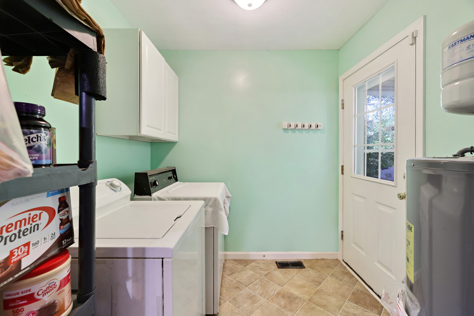634 Bennett Hill Road Red Boiling Springs, TN 37150 - Photo 14 of 44 a utility room with dryer and washer