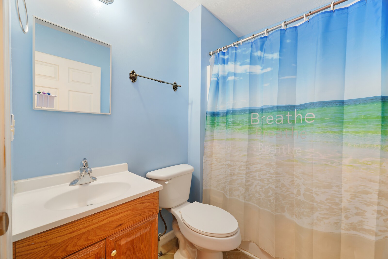 634 Bennett Hill Road Red Boiling Springs, TN 37150 - Photo 15 of 44 a bathroom with a sink a toilet and shower