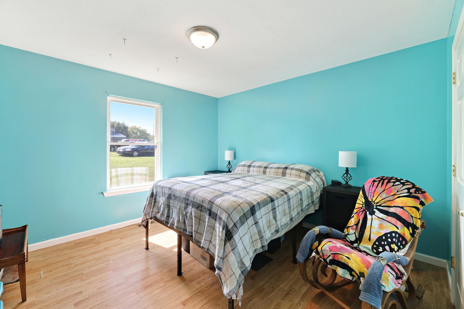 634 Bennett Hill Road Red Boiling Springs, TN 37150 - Photo 20 of 44 a bedroom with a bed and a window