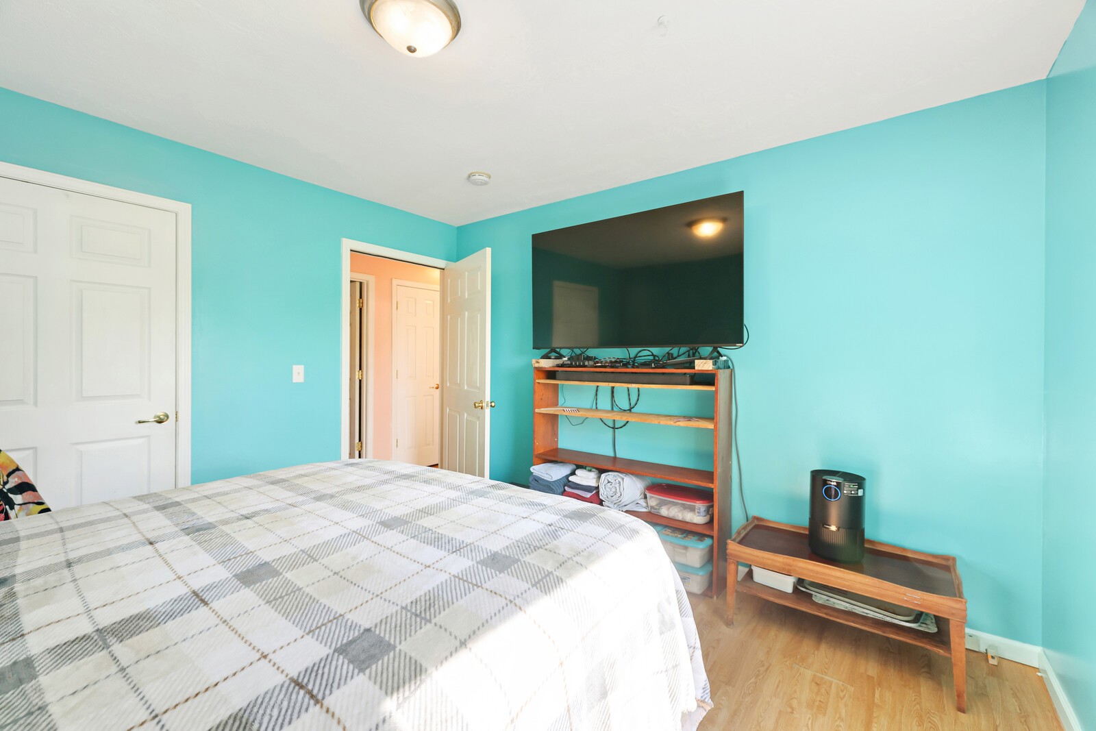 634 Bennett Hill Road Red Boiling Springs, TN 37150 - Photo 22 of 44 a bedroom with a bed and a flat screen tv