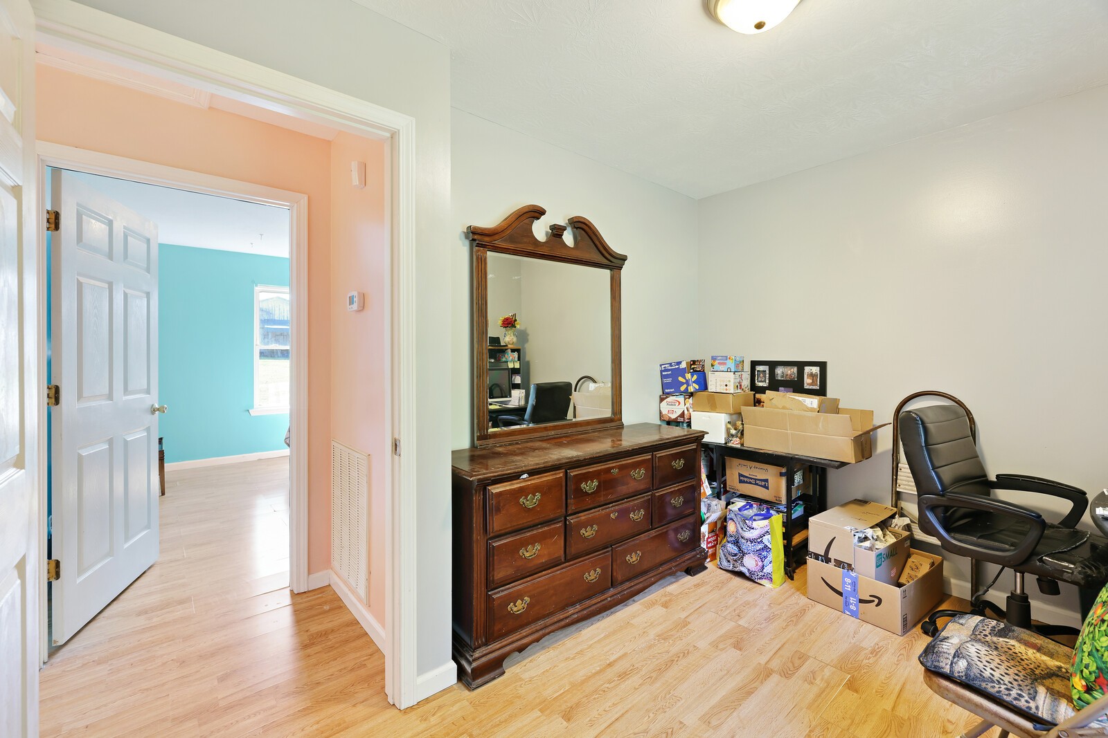 634 Bennett Hill Road Red Boiling Springs, TN 37150 - Photo 24 of 44 a view of a workspace with furniture and a mirror