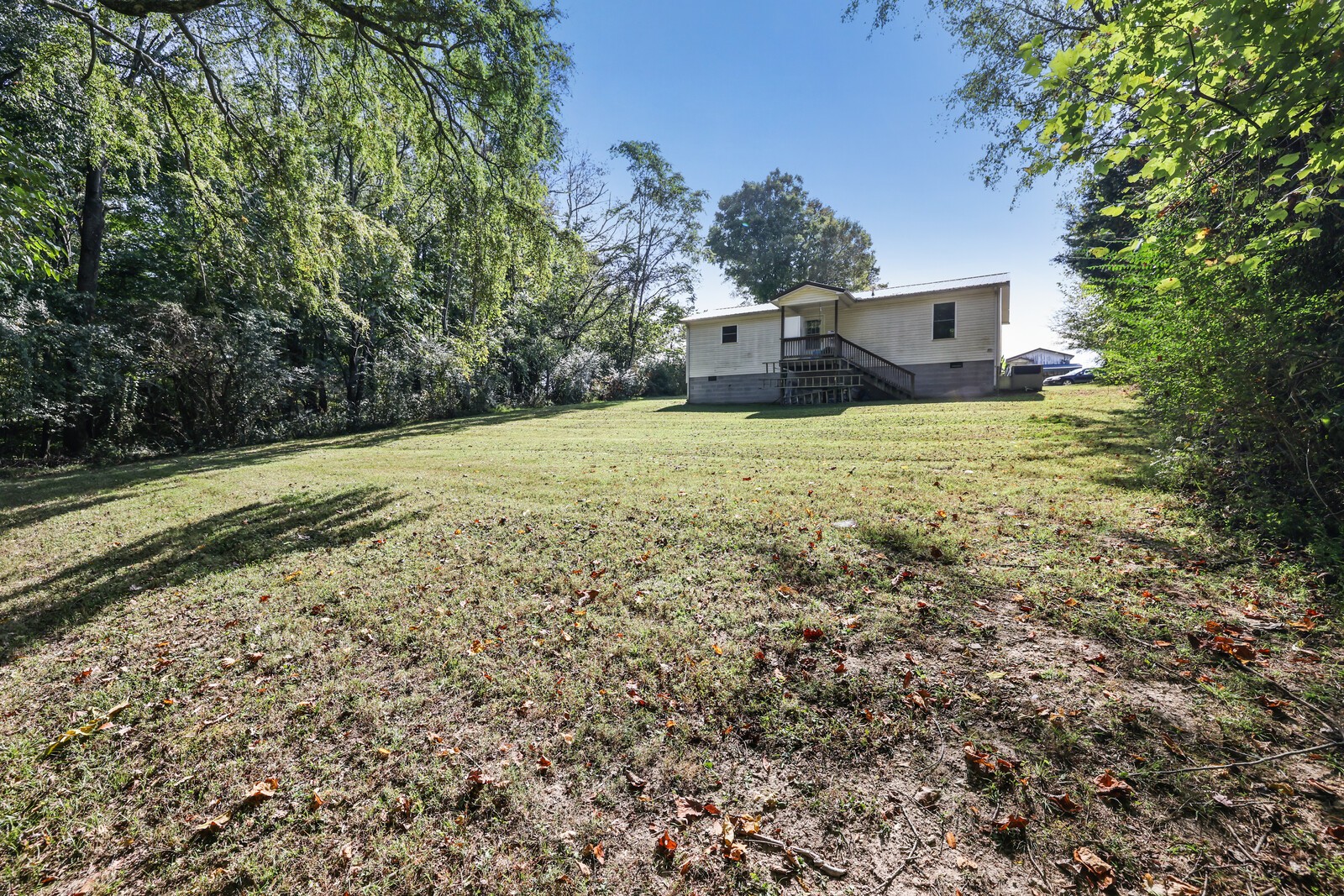 634 Bennett Hill Road Red Boiling Springs, TN 37150 - Photo 28 of 44 a big yard with lots of green space