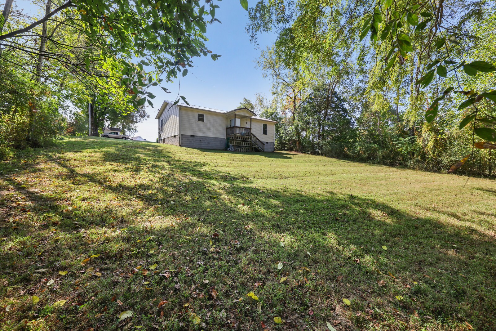 634 Bennett Hill Road Red Boiling Springs, TN 37150 - Photo 29 of 44 a house view with a garden space