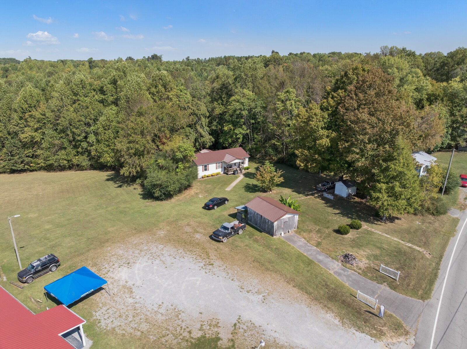 634 Bennett Hill Road Red Boiling Springs, TN 37150 - Photo 35 of 44 an aerial view of a house with a yard