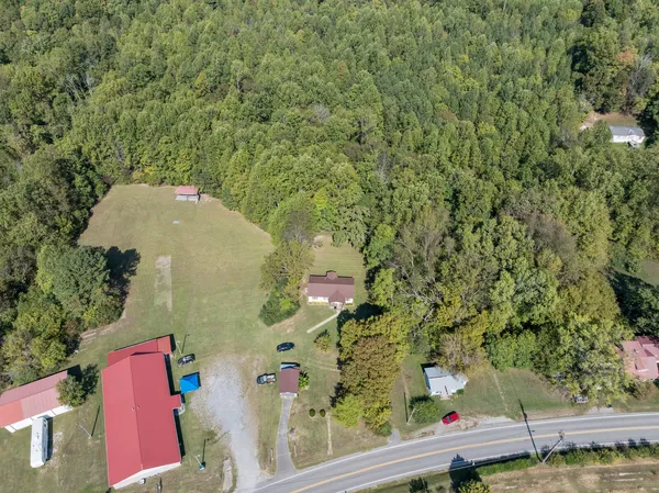 an aerial view of residential house with outdoor space