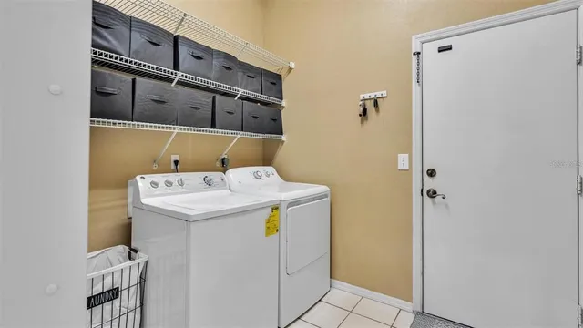 a utility room with dryer and washer