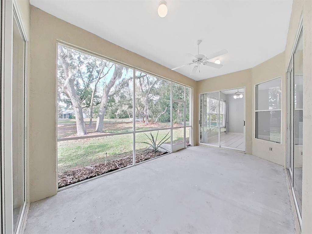 3307 Kilmer Place Plant City, FL 33566 - Photo 28 of 32 a view of an empty room window and a living room