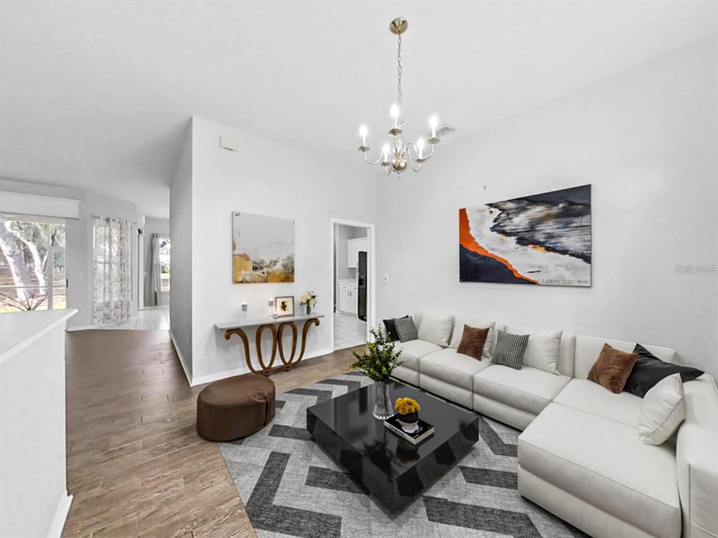 3307 Kilmer Place Plant City, FL 33566 - Photo 6 of 32 a living room with furniture