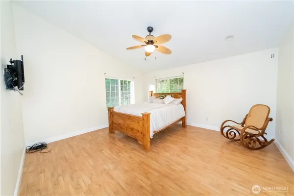 a room with mirror furniture and a window