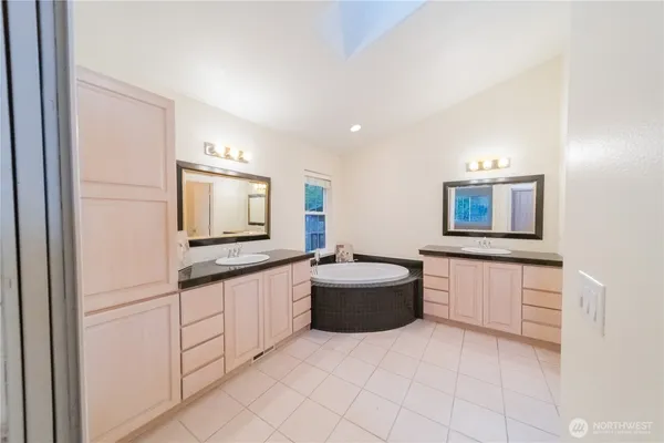a view of a kitchen from the hallway