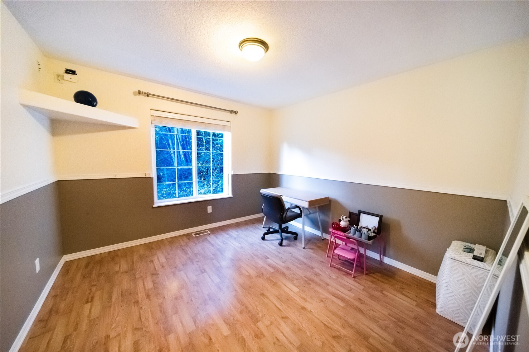 118 Clark Creek Road Longview, WA 98632 - Photo 16 of 19 a living room with furniture and a wooden floor