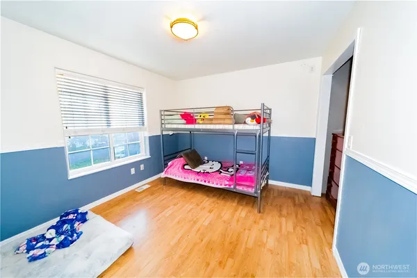 a bathroom with sink granite and a window