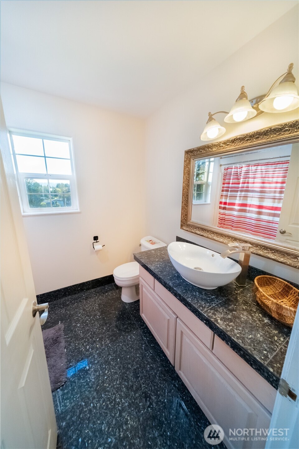 118 Clark Creek Road Longview, WA 98632 - Photo 18 of 19 a bathroom with sink granite and a window