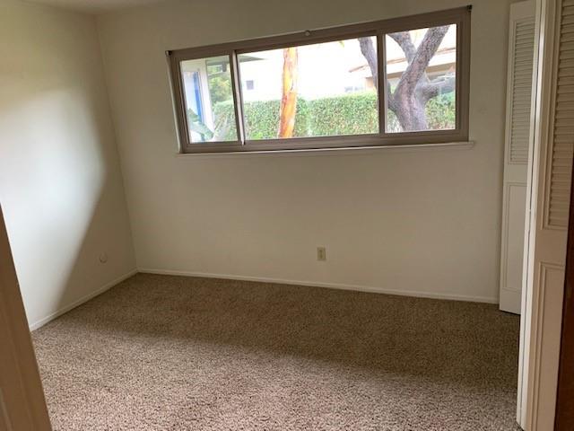 1440 Ruby Court, Unit 3 Capitola, CA 95010 - Photo 4 of 6 an empty room with a window