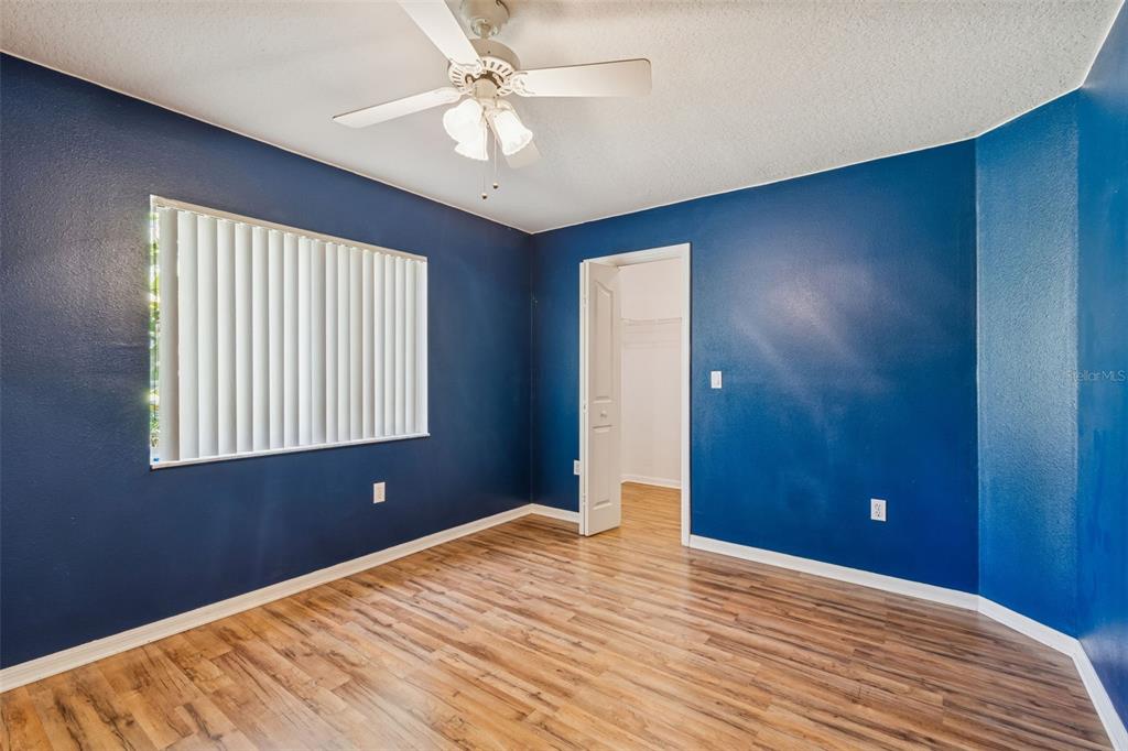 6070 Drexel Road Land O' Lakes, FL 34638 - Photo 11 of 23 a view of a livingroom with a ceiling fan and window