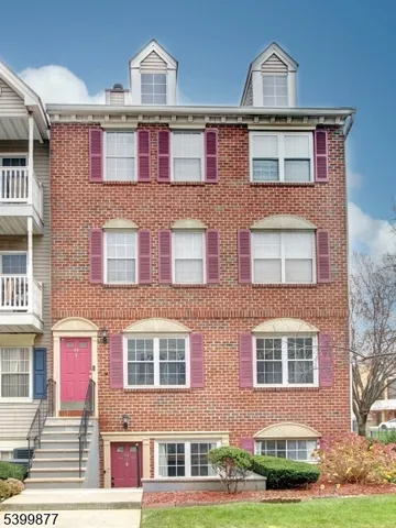 a front view of a multi story residential apartment building