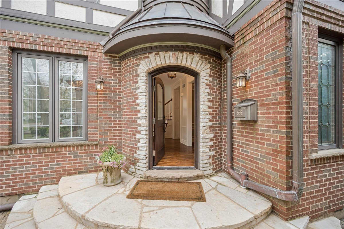 556 Willow Road Winnetka, IL 60093 - Photo 2 of 43 a view of a wooden door of the house