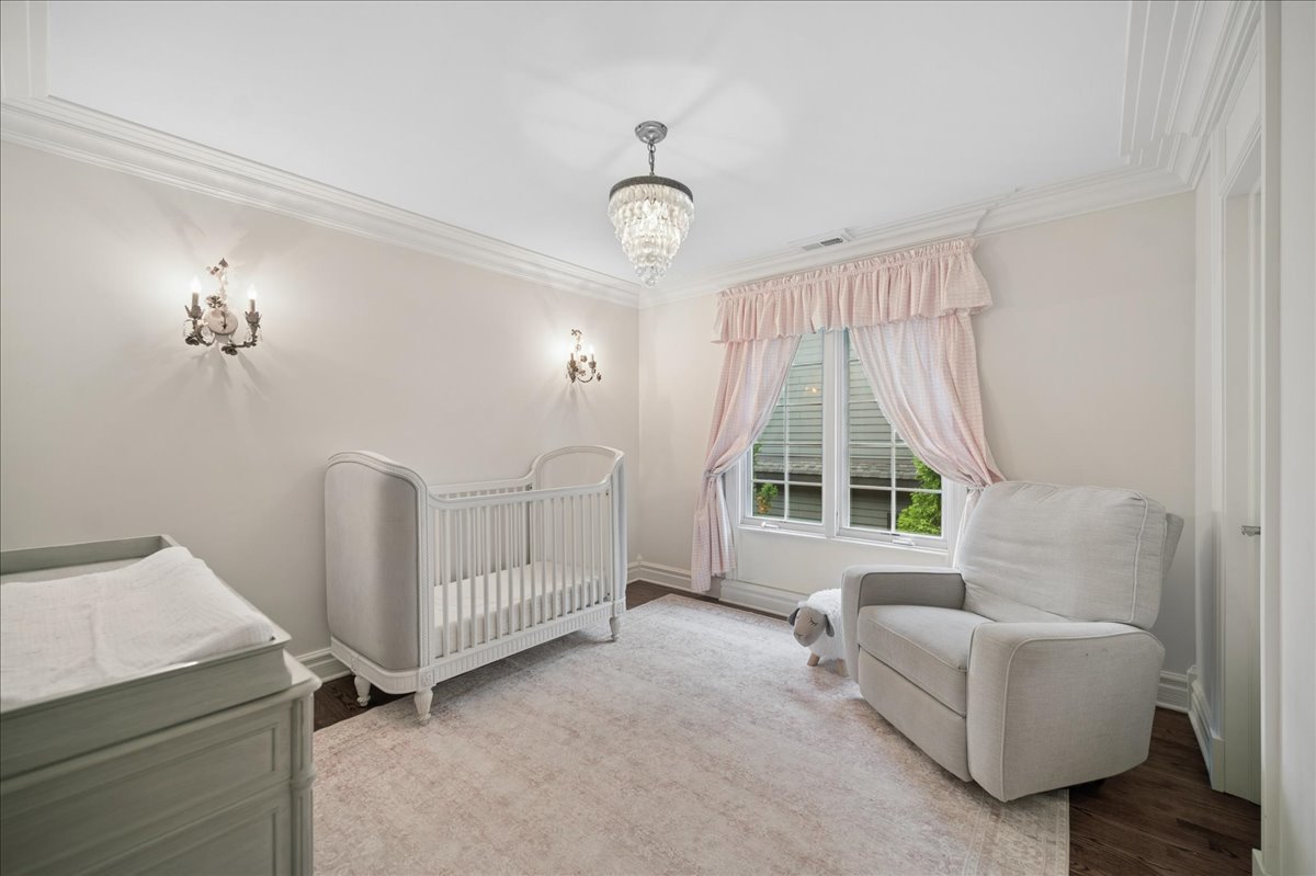 556 Willow Road Winnetka, IL 60093 - Photo 27 of 43 a living room with furniture and a window