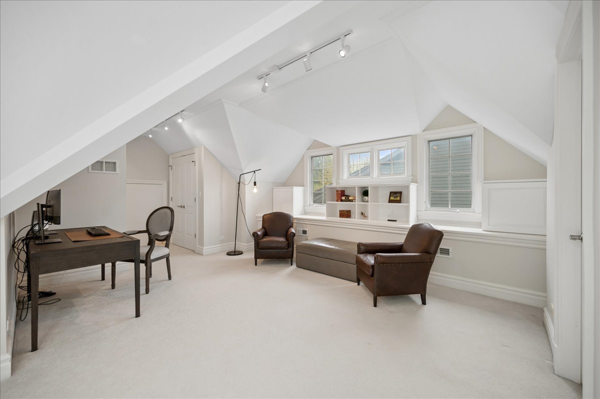 556 Willow Road Winnetka, IL 60093 - Photo 30 of 43 a living room with furniture and a piano