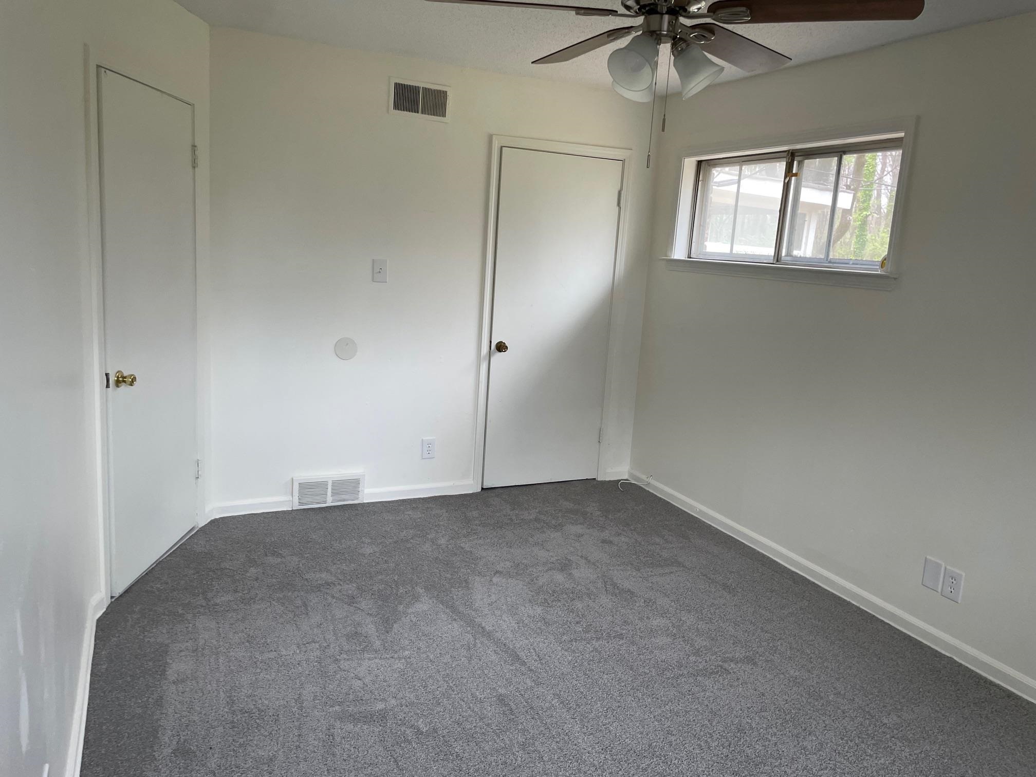 1898 Pennel Road Memphis, TN 38116 - Photo 14 of 34 a view of an empty room with a window