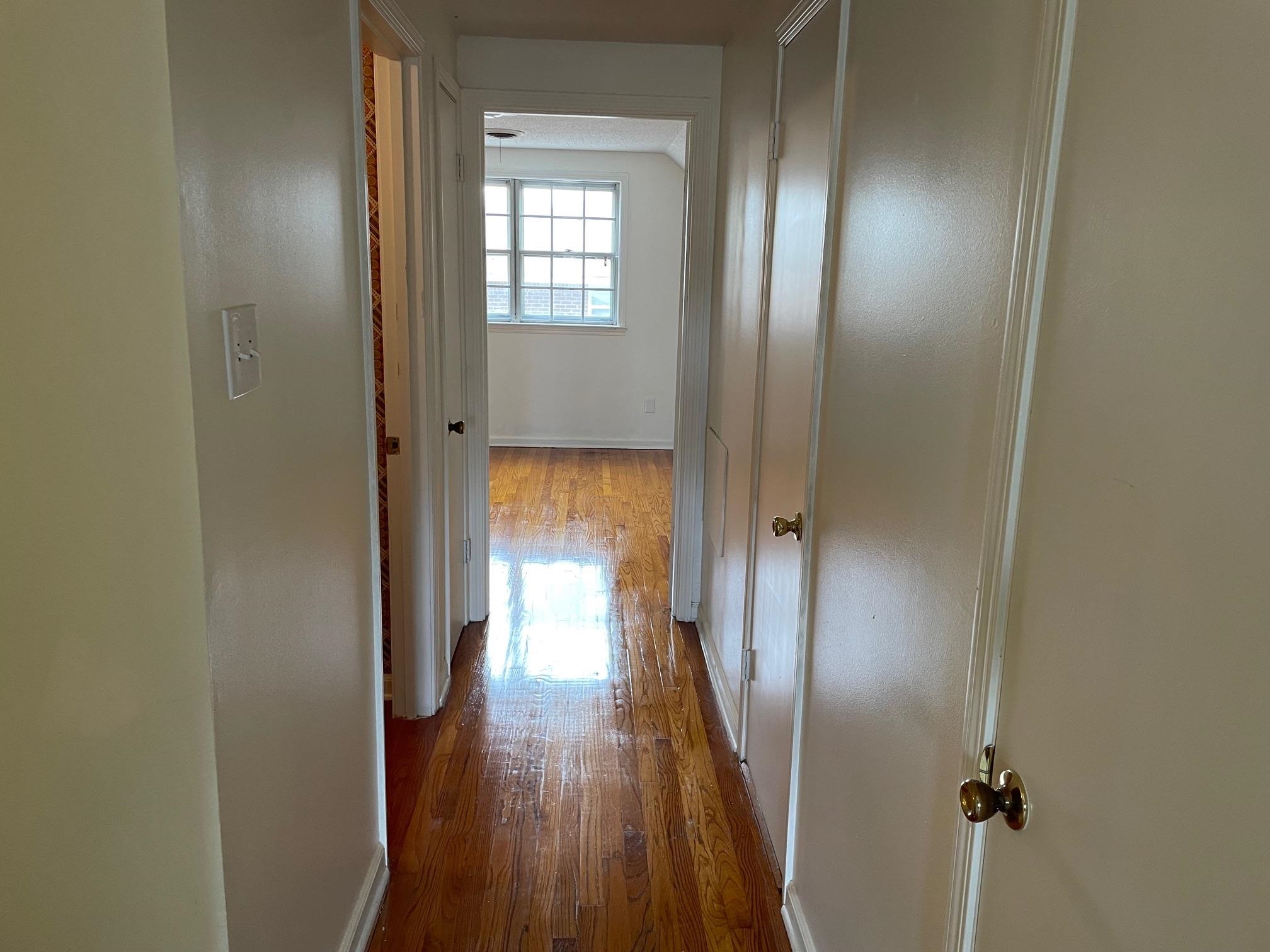 1898 Pennel Road Memphis, TN 38116 - Photo 30 of 34 a view of empty room with wooden floor