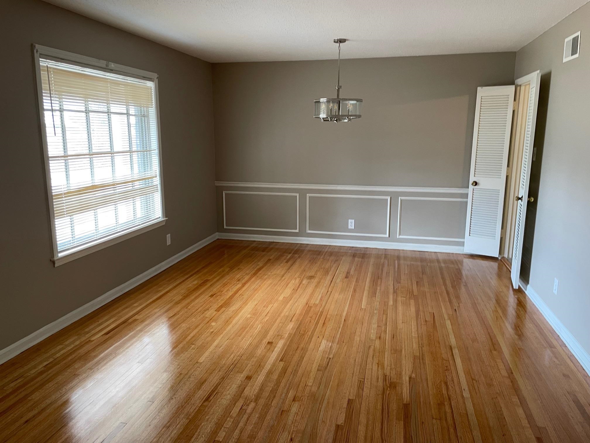 1898 Pennel Road Memphis, TN 38116 - Photo 3 of 34 a view of empty room with wooden floor and fan